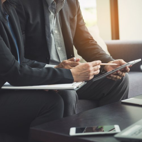 Team work process. young business managers crew working with new startup project. labtop on wood table, typing keyboard, texting message, analyze graph plans.